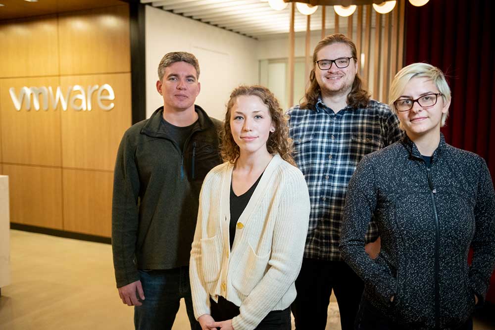 A group of Northeastern co-op students and alumni at VMWare|Genevieve Epstein (facing) and Liam Weldon|Liam Weldon|David Silvia|Sasha Rudyakov