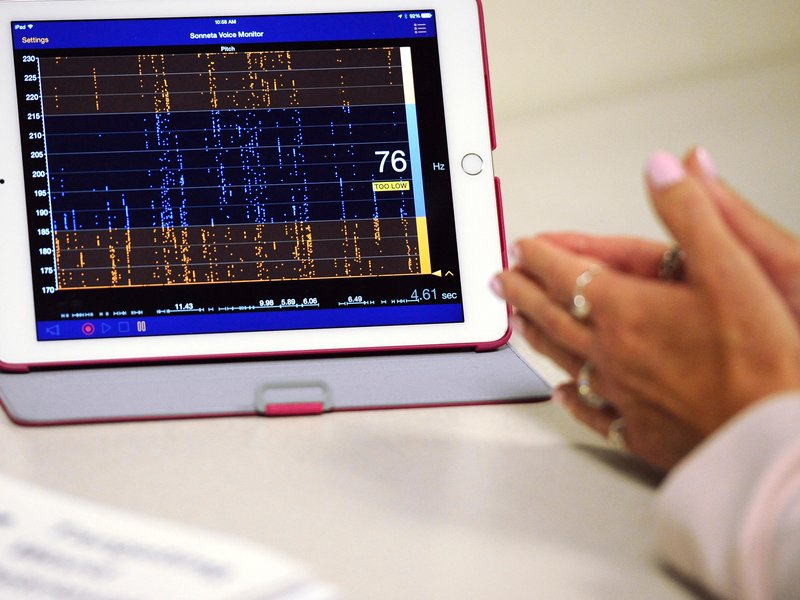 A voice therapy app runs on an iPad