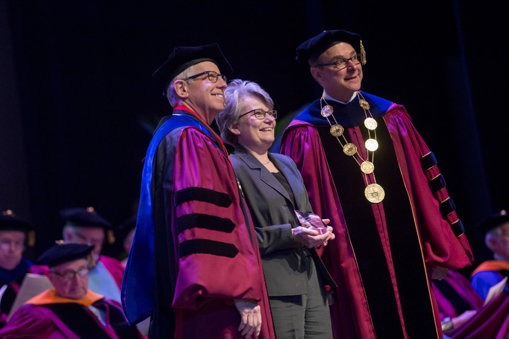 CCIS Associate Dean Doreen Hodgkin accepts the Outstanding Service Award from Northeastern President Joseph E. Aoun and Provost Stephen W. Director