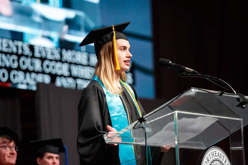 Undergraduate speaker Gwen Friedman speaks from the podium