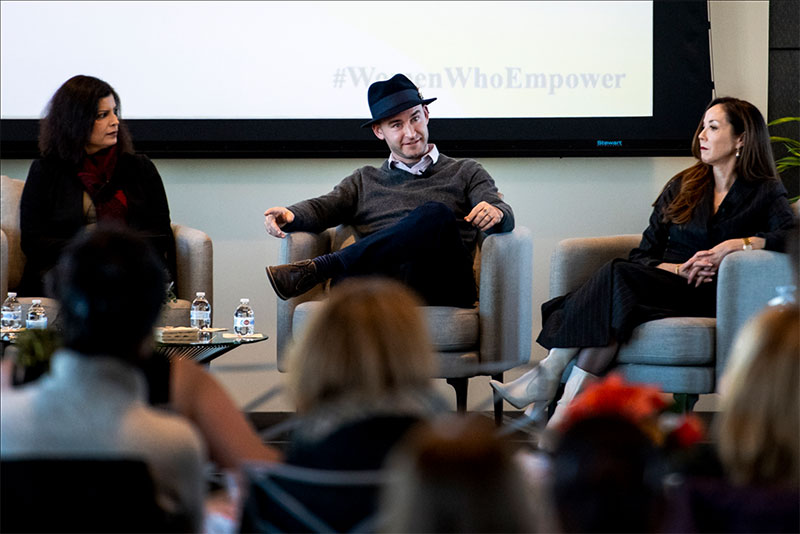 Eliassi-Rad (left) and Emmy-award-winning producer Nina Fialkow (right) look on as Khoury College professor — and 2019 Excellence in Research and Creativity Award winner — Christo Wilson speaks. Photo by Ruby Wallau/Northeastern University