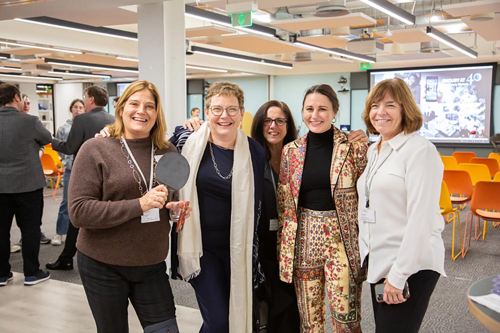 Dean Elizabeth Mynatt poses with members of Khoury College staff from both the Boston and London campuses. Photo by Kalory.co.uk.