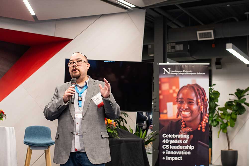 Alan Jamieson, Director of Computing Programs at the Roux Institute in Portland, speaks to the audience during the 40th Anniversary Celebration.