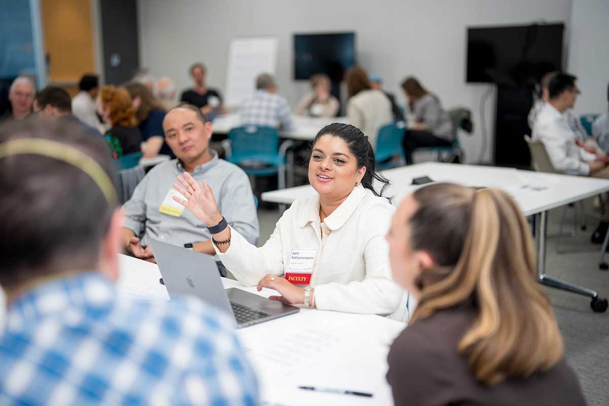 Khoury faculty have a discussion during a breakout session