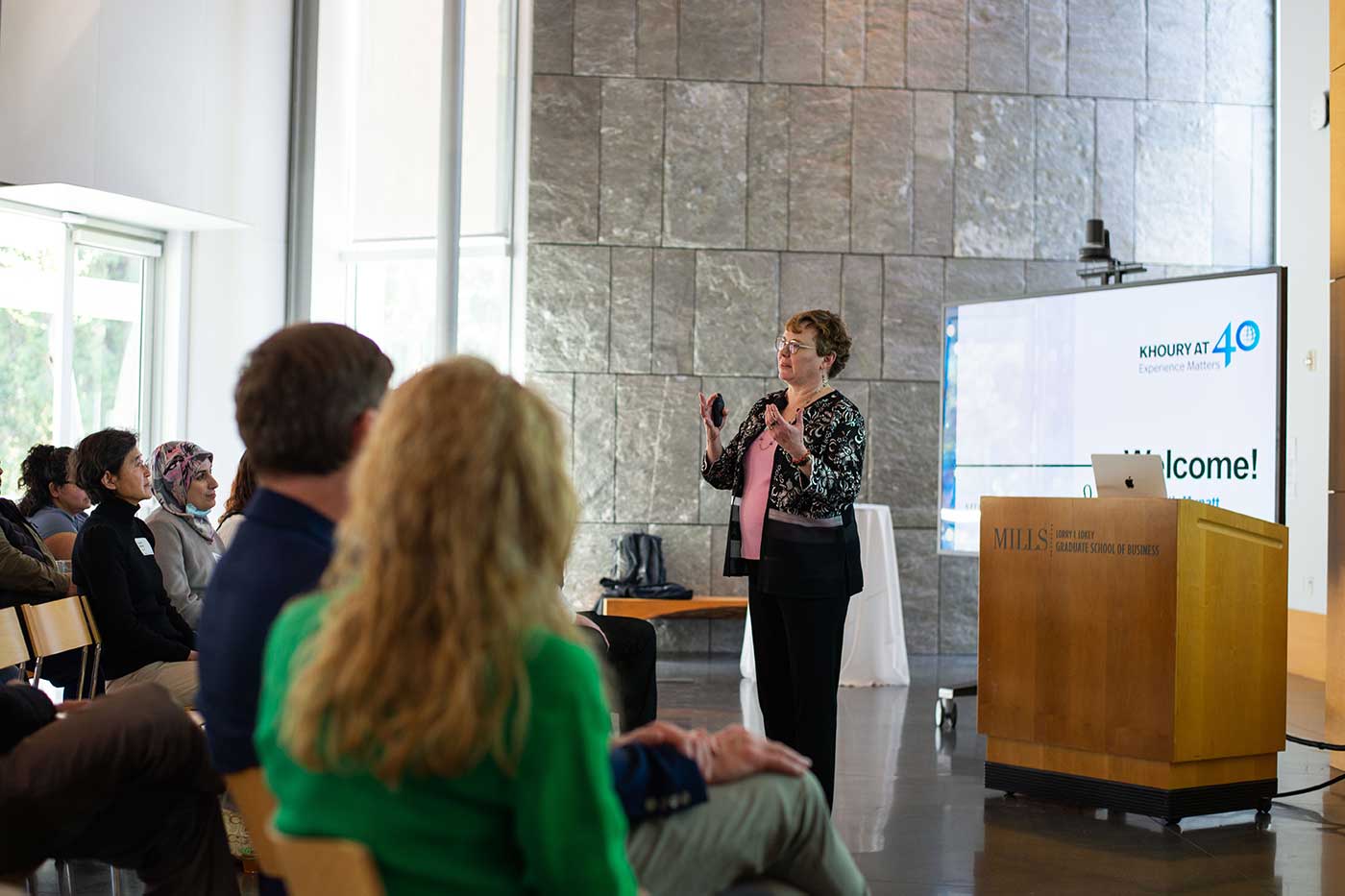 Dean Elizabeth Mynatt speaks to the audience at the Mills College 40th anniversary celebration