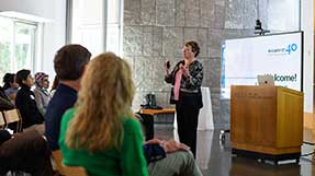 Dean Elizabeth Mynatt speaks to the audience at the Mills College 40th anniversary celebration