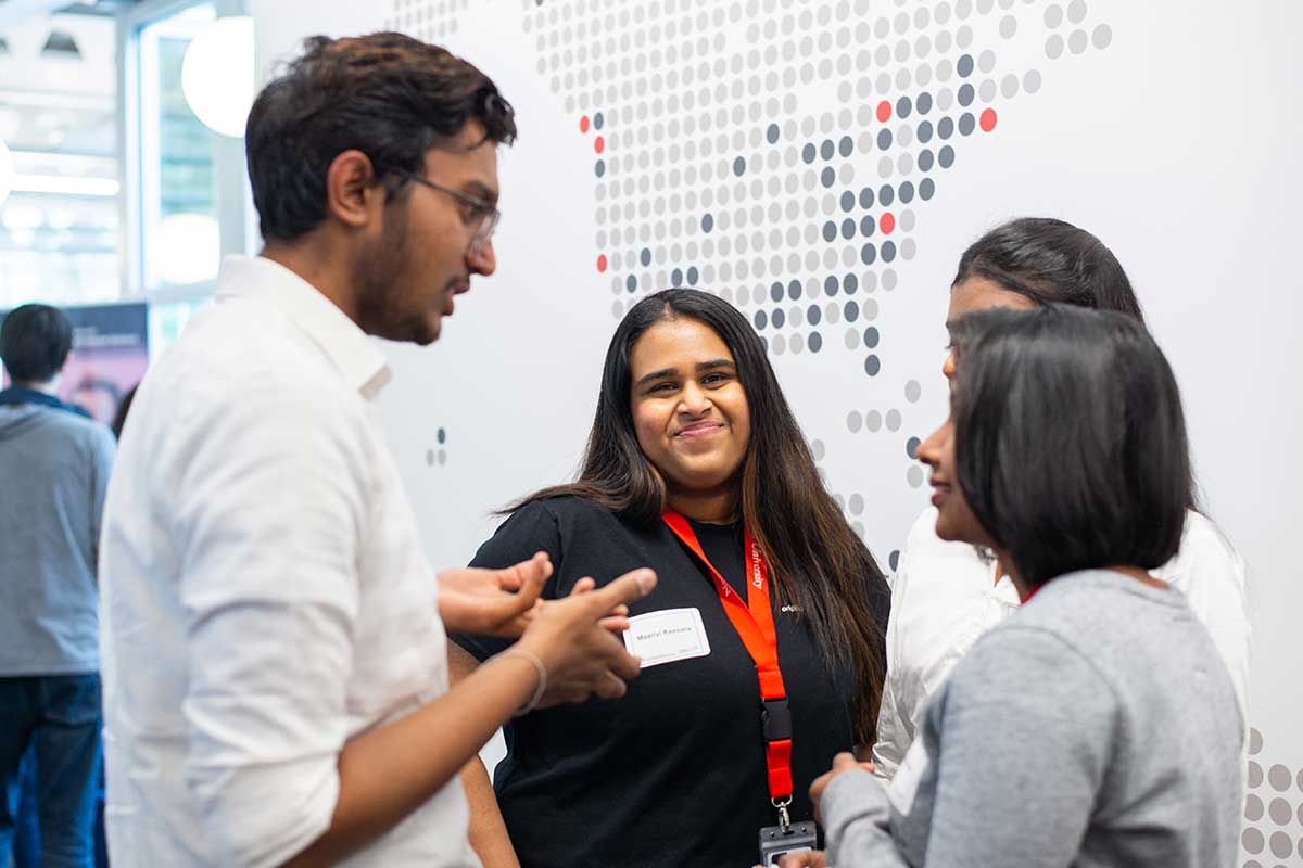 Students mingle at the Khoury 40th anniversary celebration in Seattle.