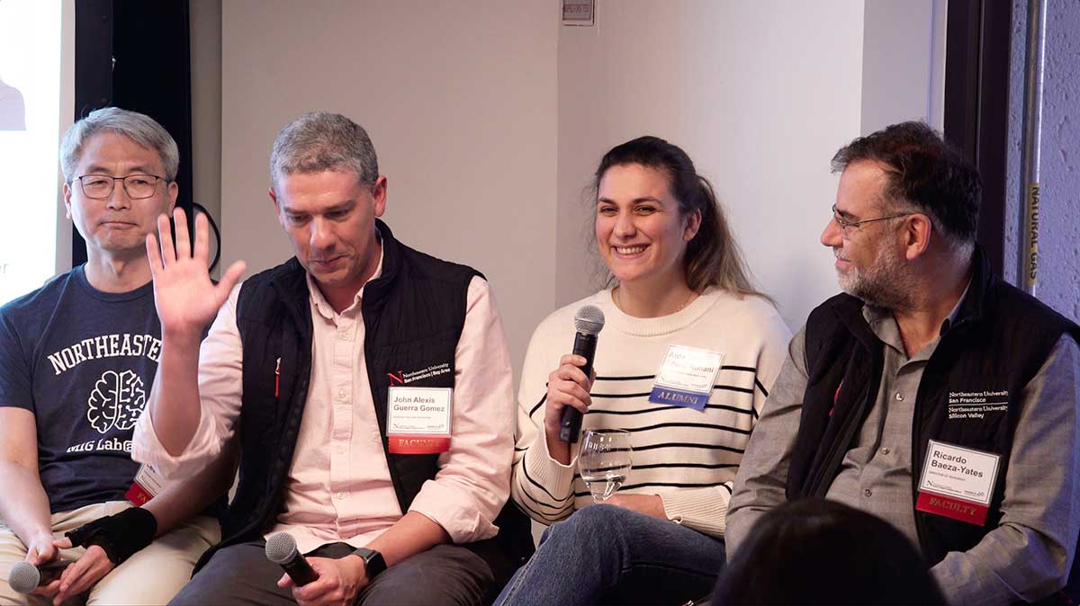 Faculty members speak during a panel discussion during the 40th anniversary celebration at Silicon Valley