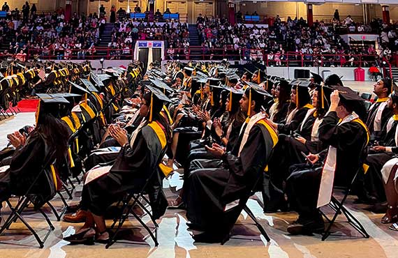 Graduate students view the stage during the ceremony