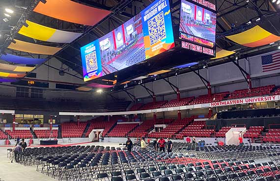 Matthews Arena workers set up for the ceremonies