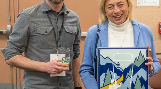 Align student Sean Sullivan (left) poses with Maine Governor Janet Mills at the New England Craft Brew Summit.