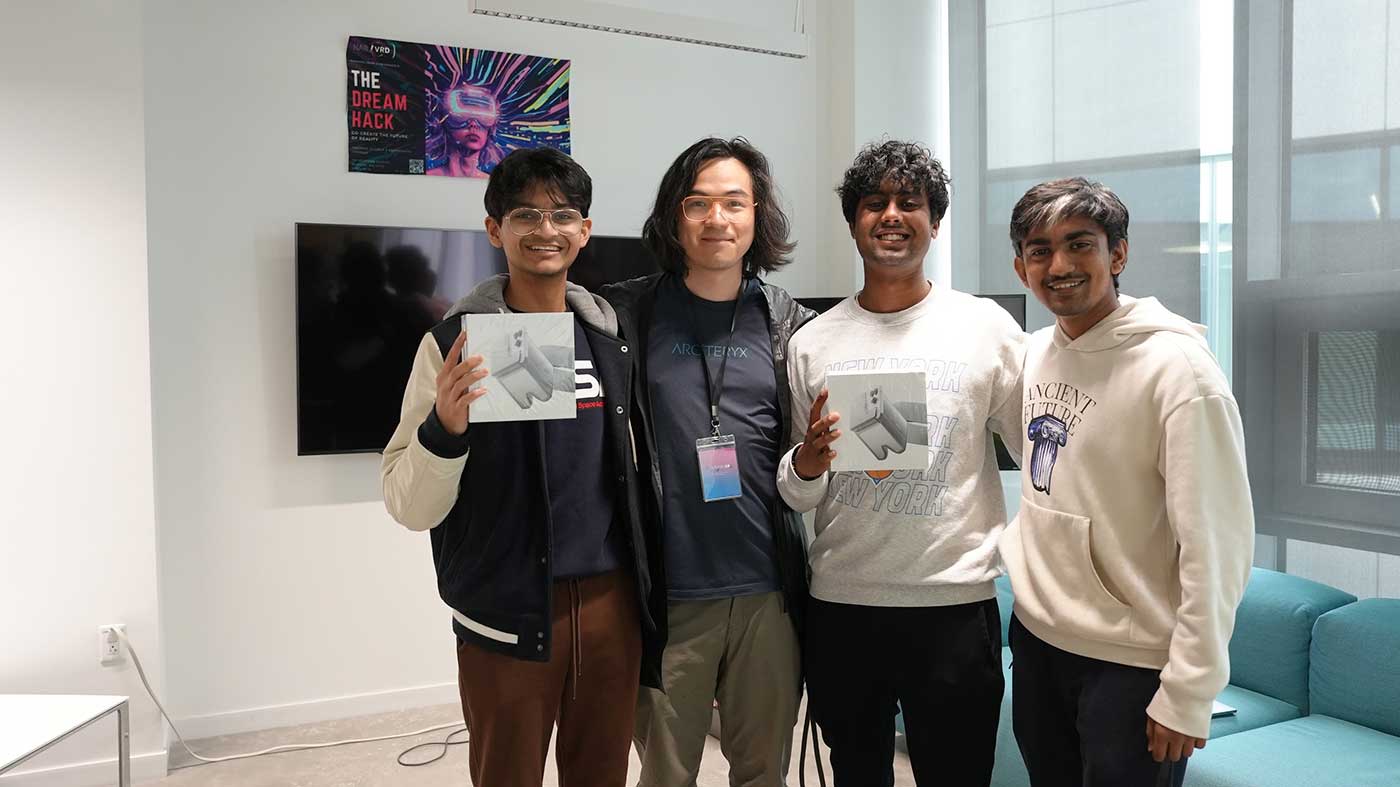 The team poses with HoloKit AR goggles creator Botao Amber Hu (second from left).