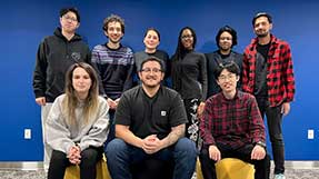 Malihe Alikhani (top, third from left) and Anthony Sicilia (bottom, center) stand with the Alexa Taskbot team