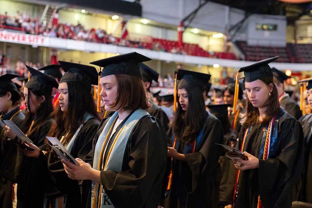 Undergraduates are shown reciting the Khoury College Oath for Computing.