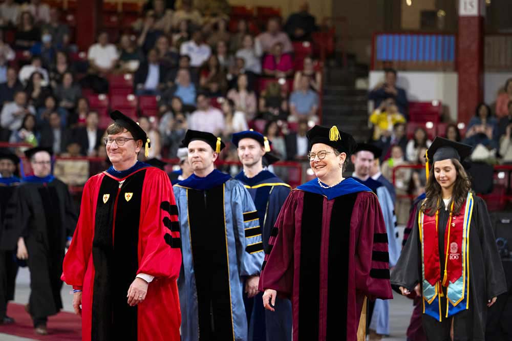 Dean Elizabeth Mynatt takes in the moment with (l-r) Ben Hescott, Senior Associate Dean of Academic Programs and Student Experience, Nate Derbinsky, Associate Dean of Teaching Faculty, Christo Wilson, Associate Professor and Associate Dean of Undergraduate Programs, and undergraduate ceremony speaker Sara Takhim.