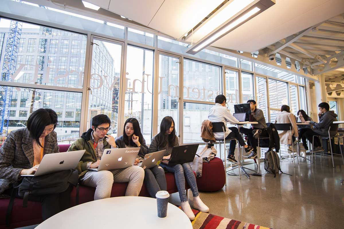 Students work and socialize in spaces designed to maximize light and minimize energy usage.