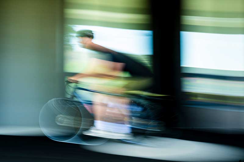 A cyclist rides a bike on Northeastern's campus. Bikes with wireless gear shifting systems are vulnerable to hacking, new Northeastern research shows. Photo by Alyssa Stone/Northeastern University