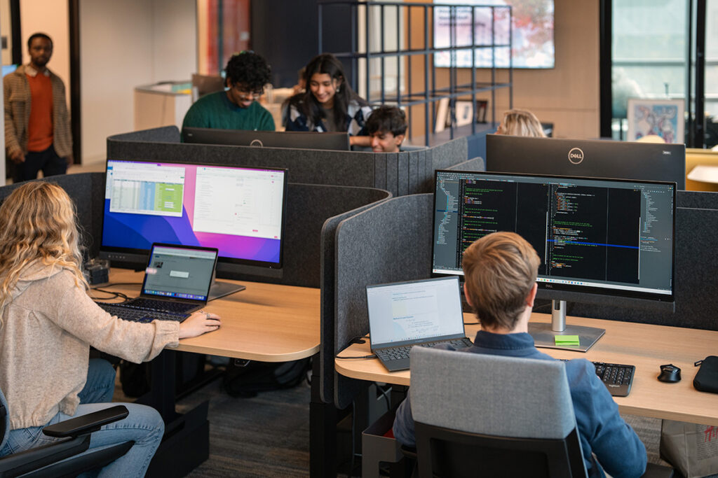 Students work together on a coding project