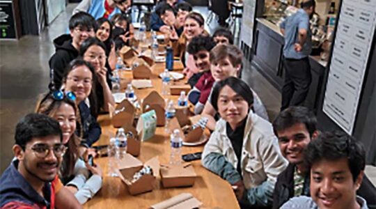 Professor John Alexis Guerra Gomez (foreground) and students from the CS Coalition in Oakland