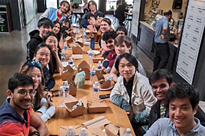 Professor John Alexis Guerra Gomez (foreground) and students from the CS Coalition in Oakland