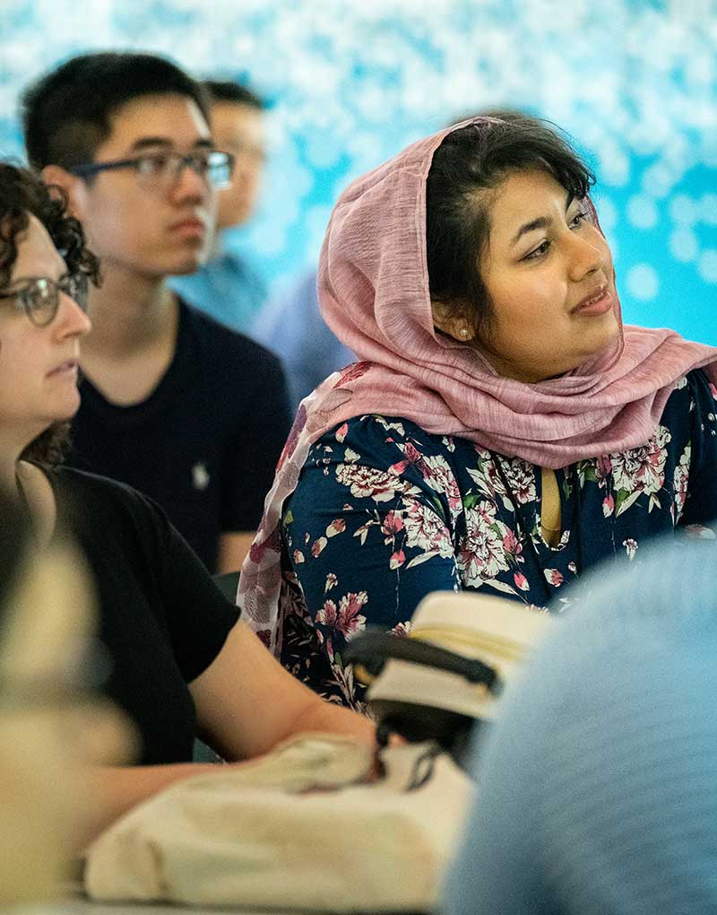 Prospective Align students watch a lecture during a Break Into Tech event.