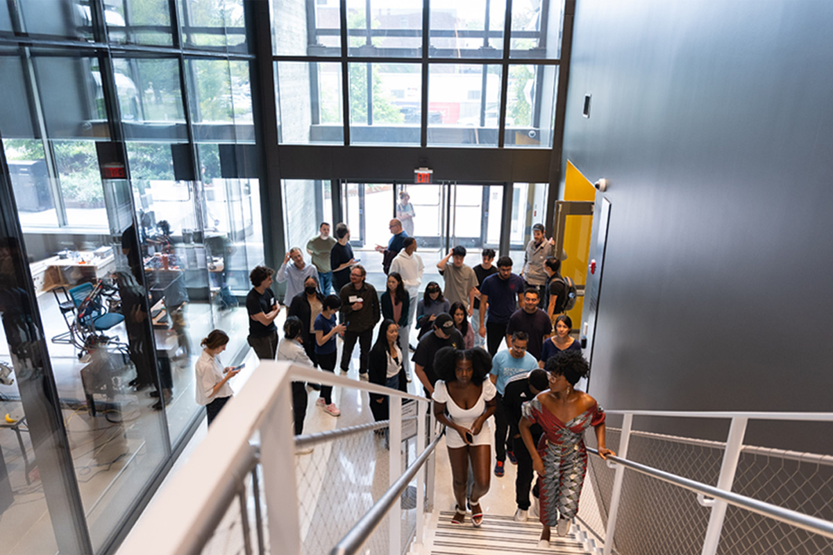 A group tours Northeastern's EXP building