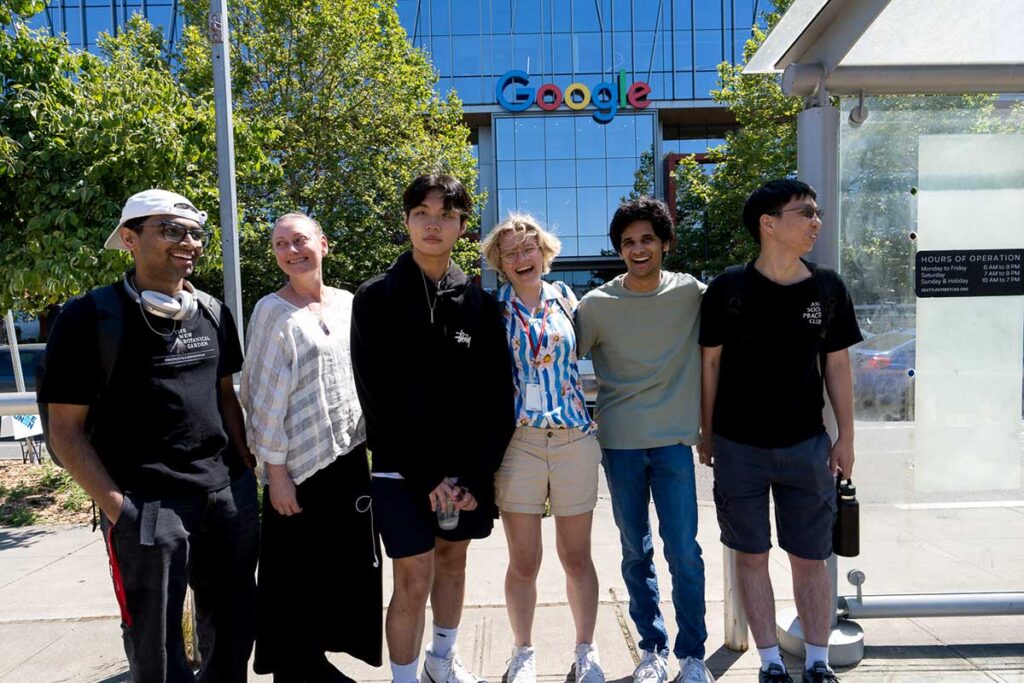 Six Khoury students pose for a photo in front of a Google building in Seattle