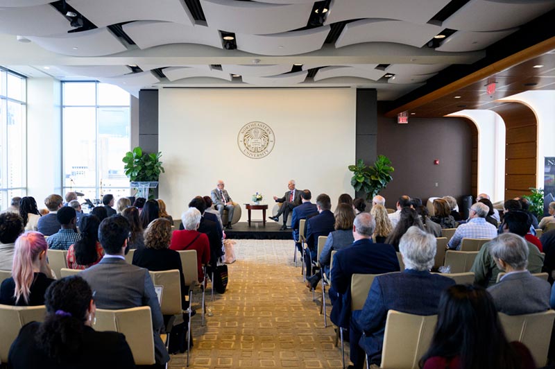 A large audience participated in a fireside chat between Amin Khoury and Northeastern President Joseph E. Aoun to kick off the 40th anniversary celebration of the Khoury College of Computer Sciences. Photo by Matthew Modoono/Northeastern University