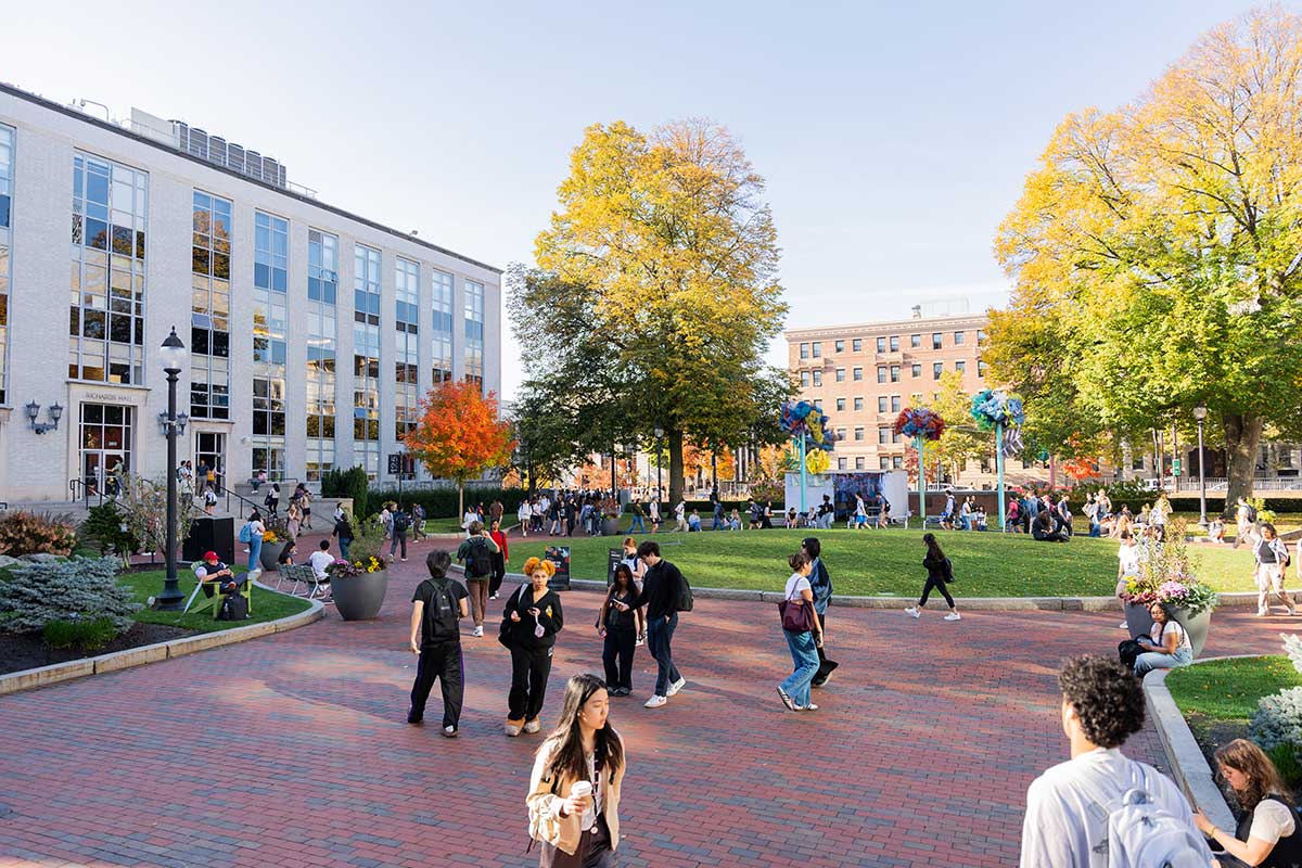 Students walk around Krentzman Quad on Northeastern's Boston campus