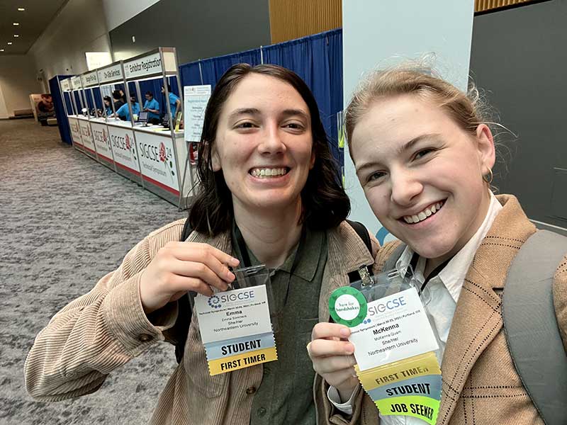 McKenna Quam (right) and fellow NU student Emma Sommers at SIGCSE TS in 2024.