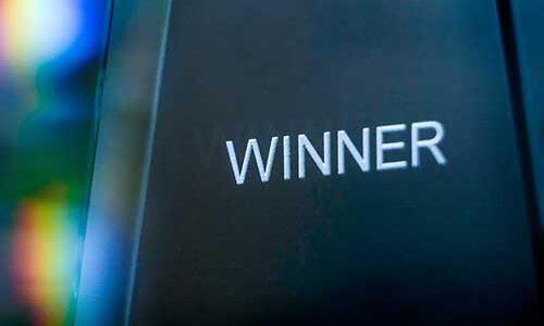 An award plaque that says "winner"