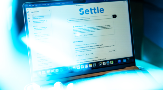 A laptop screen showing the homepage of the Settle app. Photo by Alyssa Stone/Northeastern University