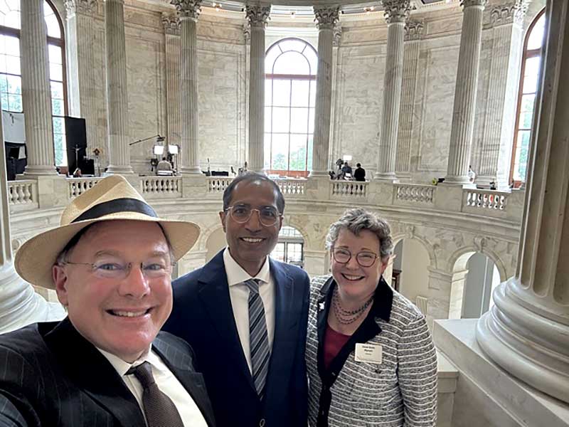 Mynatt (left) and Khoury College Associate Dean of Faculty Affairs Rajmohan Rajamaran (center) in the US Capitol Building