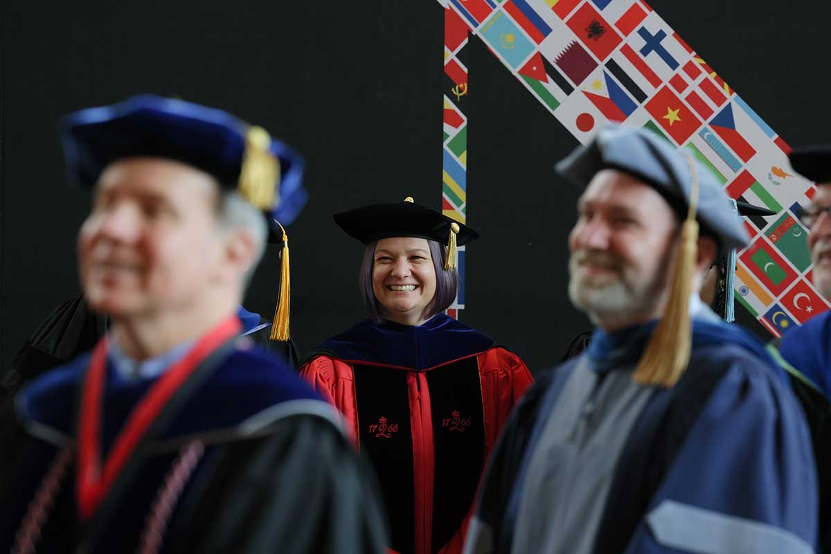 Bethany Edmunds, the Seattle campus's interim director of computing programs, joins the academic procession