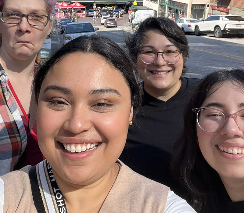 Marcela Perro (foreground) with fellow Align students outside Pike Place Market in Seattle