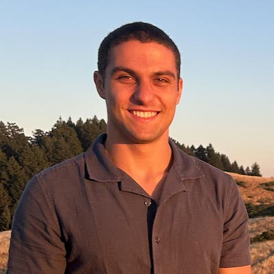 Headshot of Milo Margolis, Northeastern and Khoury College student and the subject of the article on HouseFly.