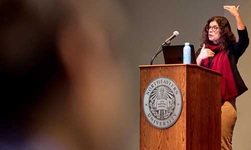 Tina Eliassi-Rad speaks at an AI Summit on the Oakland campus
