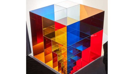 an piece of art showing Fibonacci cubes and Fibonacci squares that are blue, red, and orange