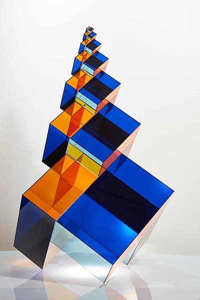 a Fibonacci pyramid, which consists of 32 Fibonacci cubes and Fibonacci cuboids; the shapes are blue and orange