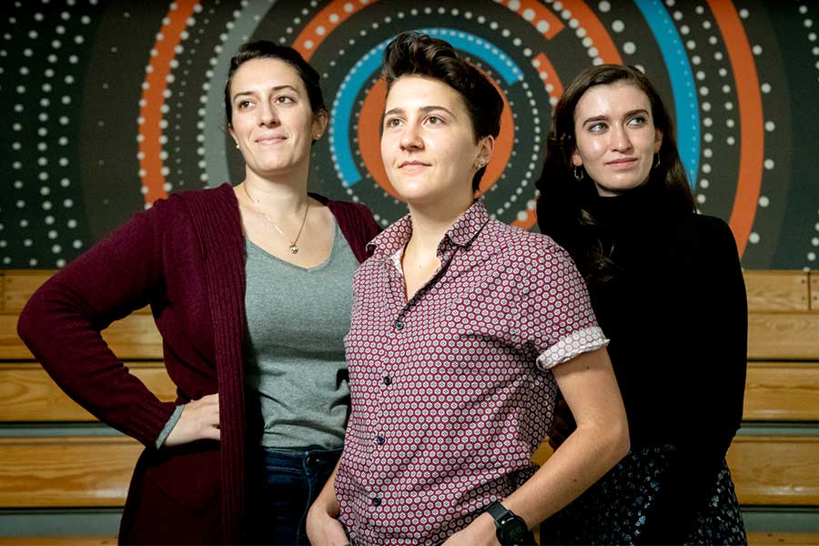 Three Khoury students pose for a photo during a co-op at HubSpot