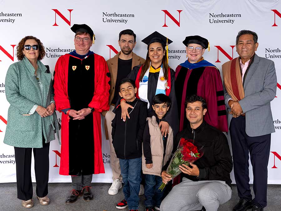 Members of the Khoury administration pose with Khoury graduate Daniela Gonzalez and her family