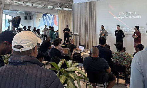 Members of a hackathon team present a project at 2026 OpenEnv Hackathon San Francisco