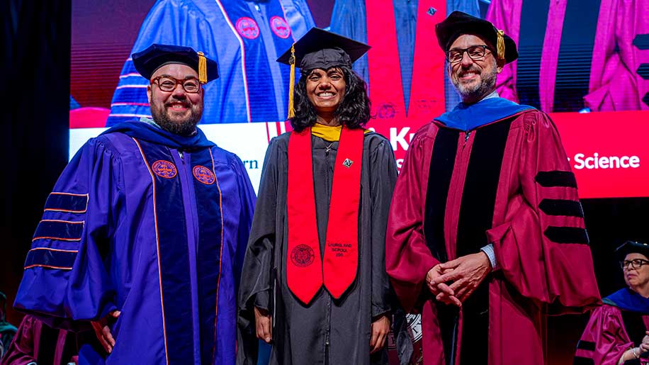 Laurel and Scroll honoree and new graduate Dipti Kulkarni with Alan Jamieson (l), teaching professor and Associate Dean of Computing Programs – East Coast, and Mike Pollastri, professor and Senior Vice Provost and Academic Lead for the Roux Institute.