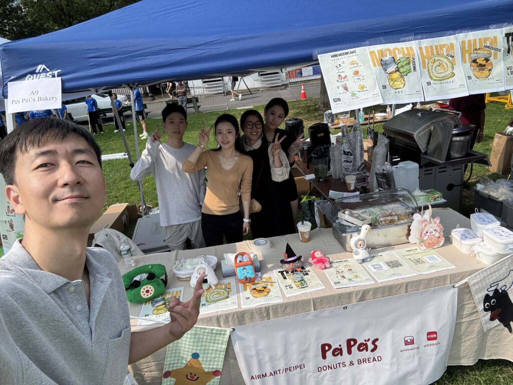 A selfie of the bakery team from Pei Pei's Donuts & Bread taken by Denfeng “Jackie” Jiang