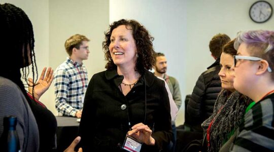 CIC founding executive director Carla Brodley talks to a group of students