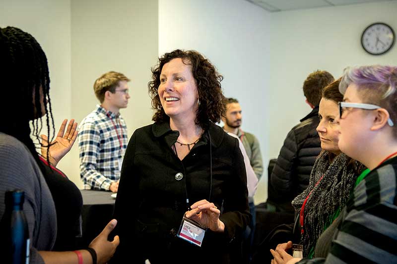 CIC founding executive director Carla Brodley talks to a group of students