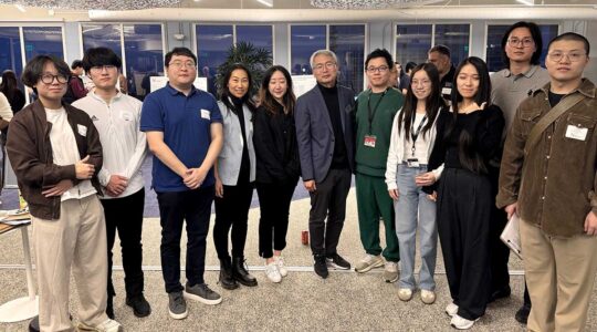 Ten members of the MiG Lab pose for a photo with advisor Jeognkyu Lee (center)