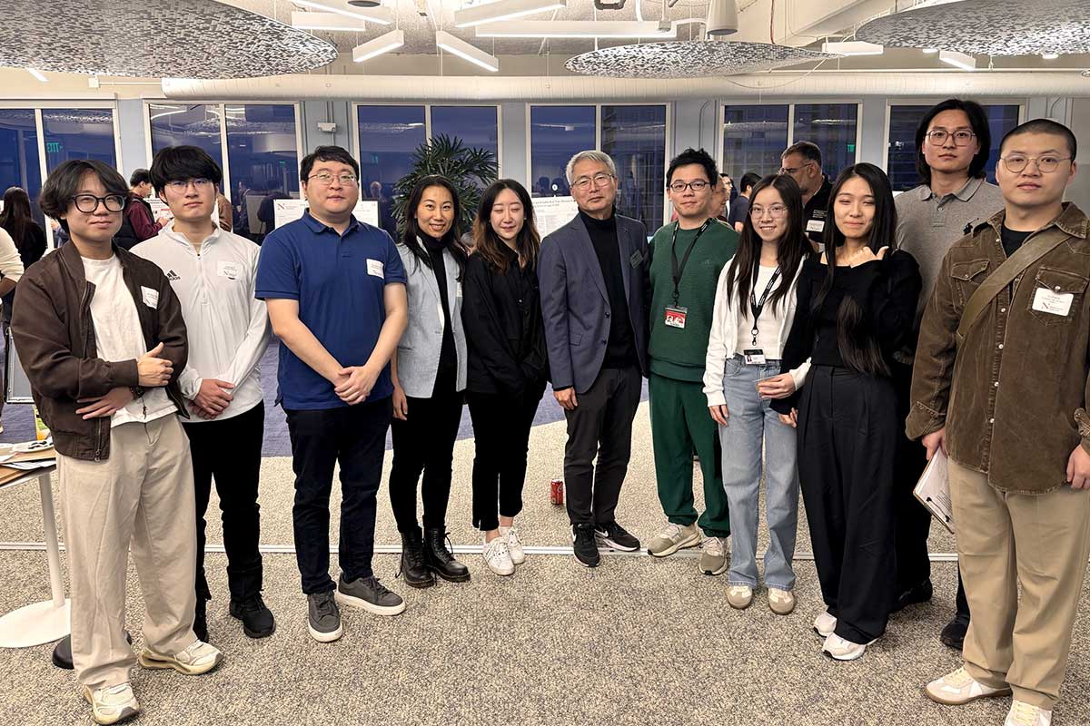 Ten members of the MiG Lab pose for a photo with advisor Jeognkyu Lee (center)