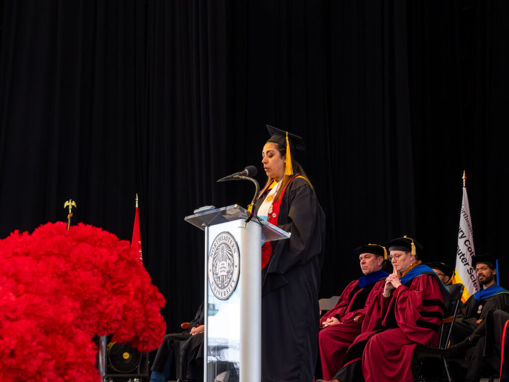 Image of Daniela Gonzalez, the subject of the article, giving her commencement speech.