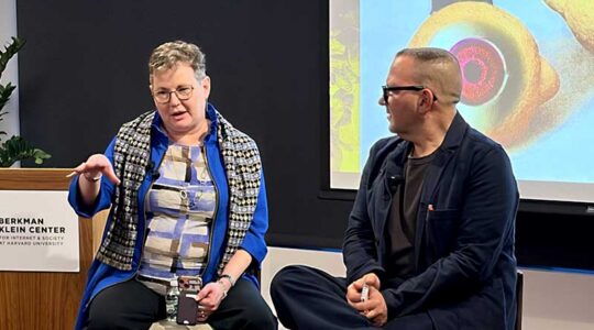 Dean Beth Mynatt (left) gestures with her hand as she speaks with Cory Doctorow